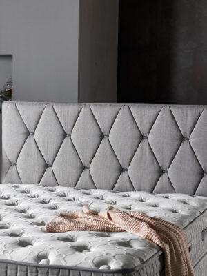 Grijze boxspring met opbergruimte