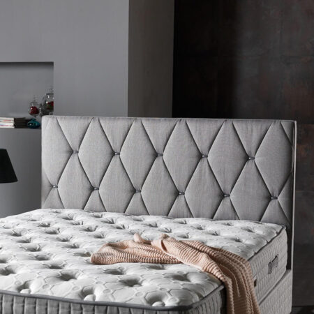 Grijze boxspring met opbergruimte