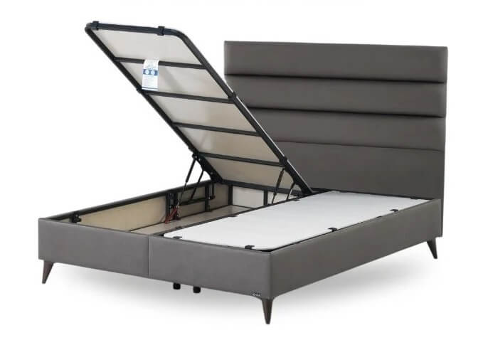 Boxspring met opbergruimte, geopend met bergruimte onder het bed
